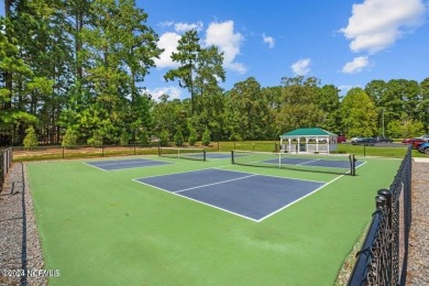 Plan your dream home on this prime residential lot for sale in on Cypress Landing Golf Club in North Carolina - for sale on GolfHomes.com, golf home, golf lot