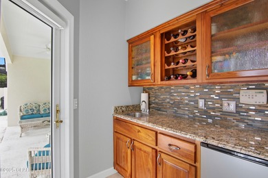 Stately Bay Point pool home with screened lanai on quiet on Bay Point Resort Golf Club in Florida - for sale on GolfHomes.com, golf home, golf lot