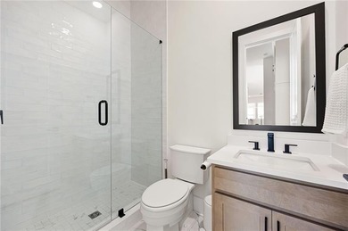 Welcome home to this executive home built by the Toll Brothers on Capital City Club Crabapple in Georgia - for sale on GolfHomes.com, golf home, golf lot