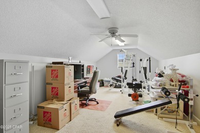 Stately Bay Point pool home with screened lanai on quiet on Bay Point Resort Golf Club in Florida - for sale on GolfHomes.com, golf home, golf lot