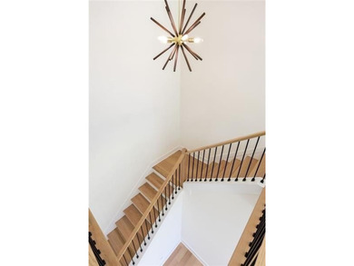 Welcome home to this executive home built by the Toll Brothers on Capital City Club Crabapple in Georgia - for sale on GolfHomes.com, golf home, golf lot