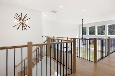 Welcome home to this executive home built by the Toll Brothers on Capital City Club Crabapple in Georgia - for sale on GolfHomes.com, golf home, golf lot