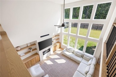 Welcome home to this executive home built by the Toll Brothers on Capital City Club Crabapple in Georgia - for sale on GolfHomes.com, golf home, golf lot