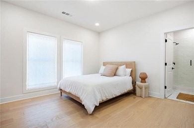 Welcome home to this executive home built by the Toll Brothers on Capital City Club Crabapple in Georgia - for sale on GolfHomes.com, golf home, golf lot