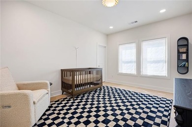 Welcome home to this executive home built by the Toll Brothers on Capital City Club Crabapple in Georgia - for sale on GolfHomes.com, golf home, golf lot