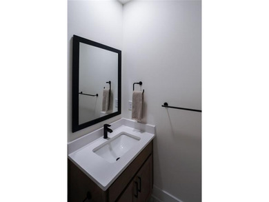 Welcome home to this executive home built by the Toll Brothers on Capital City Club Crabapple in Georgia - for sale on GolfHomes.com, golf home, golf lot