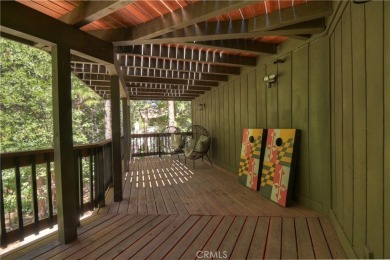Experience the perfect balance of mountain charm and modern on Lake Arrowhead Country Club in California - for sale on GolfHomes.com, golf home, golf lot