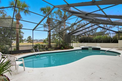Stately Bay Point pool home with screened lanai on quiet on Bay Point Resort Golf Club in Florida - for sale on GolfHomes.com, golf home, golf lot