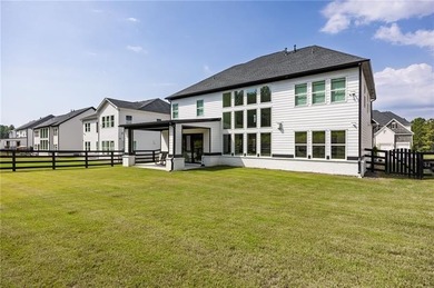 Welcome home to this executive home built by the Toll Brothers on Capital City Club Crabapple in Georgia - for sale on GolfHomes.com, golf home, golf lot