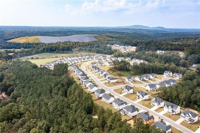 Welcome home to this executive home built by the Toll Brothers on Capital City Club Crabapple in Georgia - for sale on GolfHomes.com, golf home, golf lot