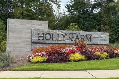 Welcome home to this executive home built by the Toll Brothers on Capital City Club Crabapple in Georgia - for sale on GolfHomes.com, golf home, golf lot