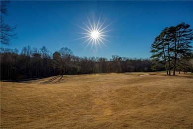 Well-maintained ranch home with a view of the 7th hole of on Hampton Golf Village in Georgia - for sale on GolfHomes.com, golf home, golf lot