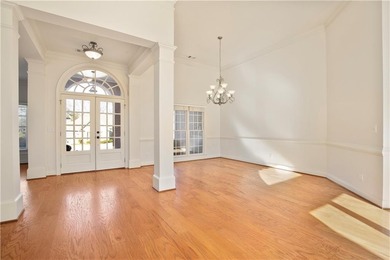 Well-maintained ranch home with a view of the 7th hole of on Hampton Golf Village in Georgia - for sale on GolfHomes.com, golf home, golf lot