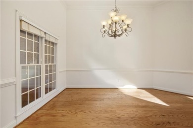 Well-maintained ranch home with a view of the 7th hole of on Hampton Golf Village in Georgia - for sale on GolfHomes.com, golf home, golf lot