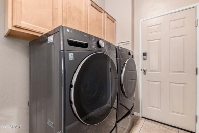 This beautiful townhome offers ensuites in both bedrooms, high on The Legacy Golf Resort in Arizona - for sale on GolfHomes.com, golf home, golf lot