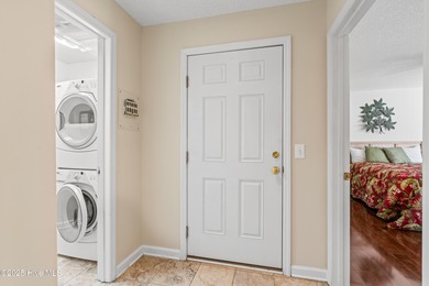 This second floor FULLY FURNISHED condo is a must see! It is a on Members Club At St. James Plantation in North Carolina - for sale on GolfHomes.com, golf home, golf lot