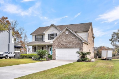 Welcome to this 4 bed 2.5 bath home in one of the most sought on Berkeley Country Club in South Carolina - for sale on GolfHomes.com, golf home, golf lot