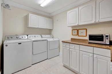 Located on quiet cul-de-sac  in Thurston. This 3 bedroom, 3.5 on PGA National Golf Club in Florida - for sale on GolfHomes.com, golf home, golf lot