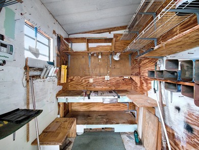 Welcome Home to this charming LAND OWNED 2/2 with a 2020 roof on Spanish Lakes Golf Village in Florida - for sale on GolfHomes.com, golf home, golf lot