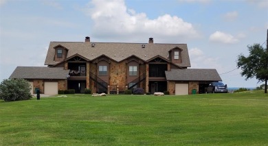 Panoramic view of Possum Kingdom Lake from the covered patio of on The Cliffs Resort in Texas - for sale on GolfHomes.com, golf home, golf lot