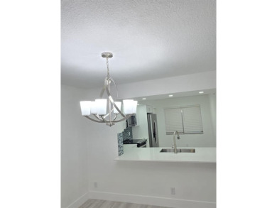 PRICE REDUCED! Very desirable unit!!Completely remodeled! 1st on Flamingo Lakes Country Club in Florida - for sale on GolfHomes.com, golf home, golf lot