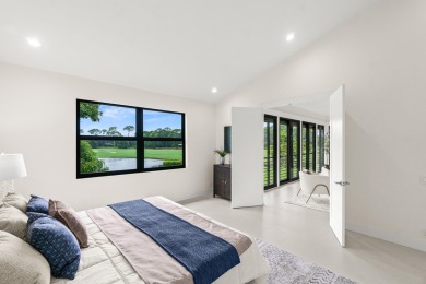With a spectacular picture-perfect view of the lake and golf on Polo Club of Boca Raton in Florida - for sale on GolfHomes.com, golf home, golf lot