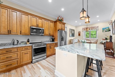 All-brick home with many upgrades is located within the Tellico on Tellico Village -The Links At Kahite Golf Course in Tennessee - for sale on GolfHomes.com, golf home, golf lot