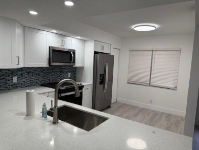 PRICE REDUCED! Very desirable unit!!Completely remodeled! 1st on Flamingo Lakes Country Club in Florida - for sale on GolfHomes.com, golf home, golf lot