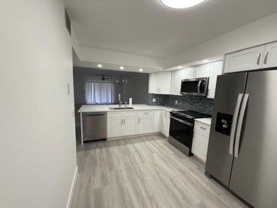 PRICE REDUCED! Very desirable unit!!Completely remodeled! 1st on Flamingo Lakes Country Club in Florida - for sale on GolfHomes.com, golf home, golf lot