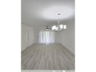 PRICE REDUCED! Very desirable unit!!Completely remodeled! 1st on Flamingo Lakes Country Club in Florida - for sale on GolfHomes.com, golf home, golf lot