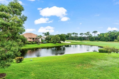 With a spectacular picture-perfect view of the lake and golf on Polo Club of Boca Raton in Florida - for sale on GolfHomes.com, golf home, golf lot