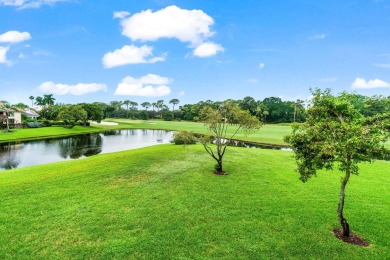 With a spectacular picture-perfect view of the lake and golf on Polo Club of Boca Raton in Florida - for sale on GolfHomes.com, golf home, golf lot