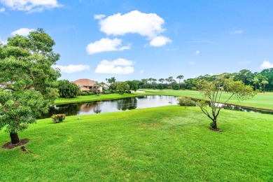 With a spectacular picture-perfect view of the lake and golf on Polo Club of Boca Raton in Florida - for sale on GolfHomes.com, golf home, golf lot
