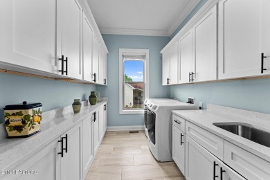 All-brick home with many upgrades is located within the Tellico on Tellico Village -The Links At Kahite Golf Course in Tennessee - for sale on GolfHomes.com, golf home, golf lot
