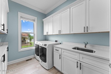 All-brick home with many upgrades is located within the Tellico on Tellico Village -The Links At Kahite Golf Course in Tennessee - for sale on GolfHomes.com, golf home, golf lot
