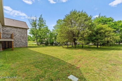 All-brick home with many upgrades is located within the Tellico on Tellico Village -The Links At Kahite Golf Course in Tennessee - for sale on GolfHomes.com, golf home, golf lot