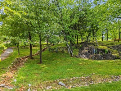 All-brick home with many upgrades is located within the Tellico on Tellico Village -The Links At Kahite Golf Course in Tennessee - for sale on GolfHomes.com, golf home, golf lot