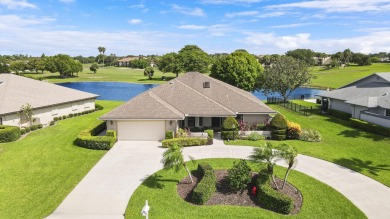 Enjoy panoramic lake and golf course views from this well on Heritage Ridge Golf Club in Florida - for sale on GolfHomes.com, golf home, golf lot