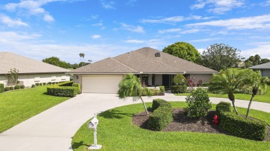 Enjoy panoramic lake and golf course views from this well on Heritage Ridge Golf Club in Florida - for sale on GolfHomes.com, golf home, golf lot