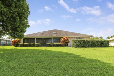 Enjoy panoramic lake and golf course views from this well on Heritage Ridge Golf Club in Florida - for sale on GolfHomes.com, golf home, golf lot