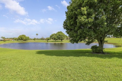 Enjoy panoramic lake and golf course views from this well on Heritage Ridge Golf Club in Florida - for sale on GolfHomes.com, golf home, golf lot