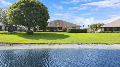 Enjoy panoramic lake and golf course views from this well on Heritage Ridge Golf Club in Florida - for sale on GolfHomes.com, golf home, golf lot