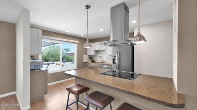 This move-in ready gem is immaculate from top to bottom and on Union Hills Country Club in Arizona - for sale on GolfHomes.com, golf home, golf lot