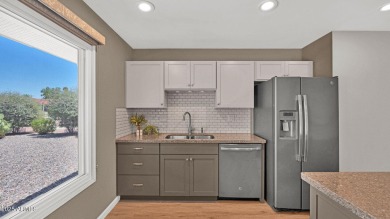 This move-in ready gem is immaculate from top to bottom and on Union Hills Country Club in Arizona - for sale on GolfHomes.com, golf home, golf lot
