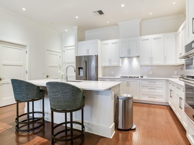 Tucked behind the secure, private gates of the esteemed Belleair on Belleair Country Club in Florida - for sale on GolfHomes.com, golf home, golf lot