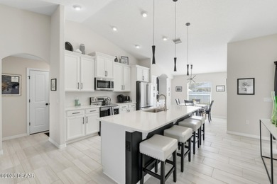 Immaculate Seagate-built Willow model located in the desirable on The Grand Club - Pine Lakes Course in Florida - for sale on GolfHomes.com, golf home, golf lot