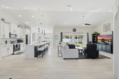 Immaculate Seagate-built Willow model located in the desirable on The Grand Club - Pine Lakes Course in Florida - for sale on GolfHomes.com, golf home, golf lot