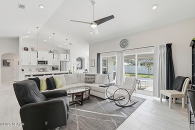 Immaculate Seagate-built Willow model located in the desirable on The Grand Club - Pine Lakes Course in Florida - for sale on GolfHomes.com, golf home, golf lot