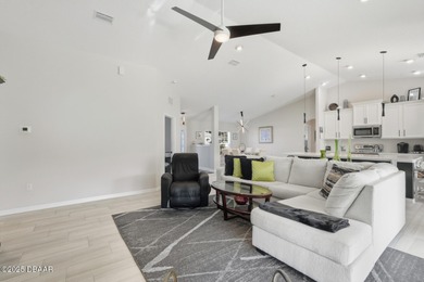 Immaculate Seagate-built Willow model located in the desirable on The Grand Club - Pine Lakes Course in Florida - for sale on GolfHomes.com, golf home, golf lot