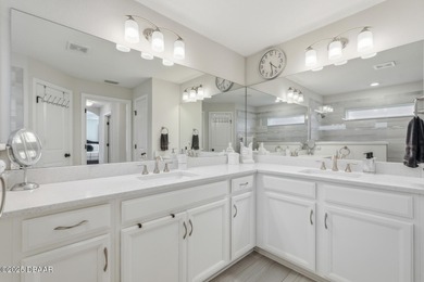 Immaculate Seagate-built Willow model located in the desirable on The Grand Club - Pine Lakes Course in Florida - for sale on GolfHomes.com, golf home, golf lot